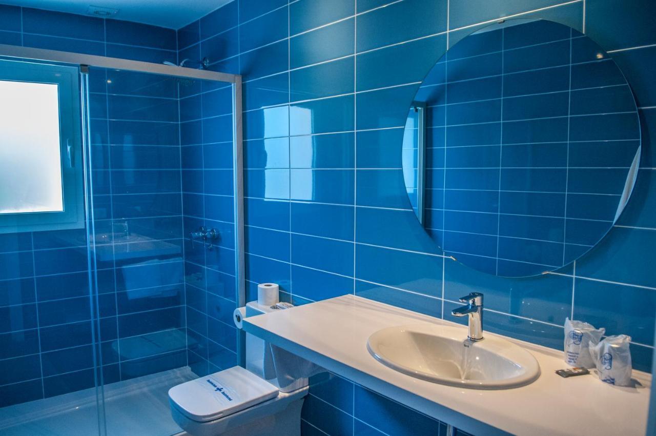 Hostal Xuroy Cala Alcaufar Eksteriør billede